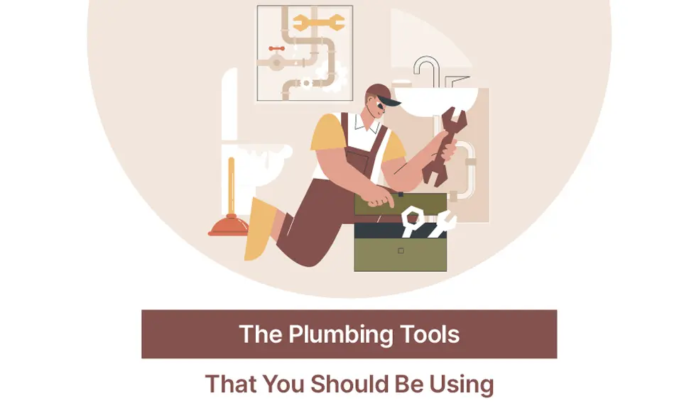 Plumber kneeling beside a sink with wrench and toolbox, referencing a pipe diagram on the wall