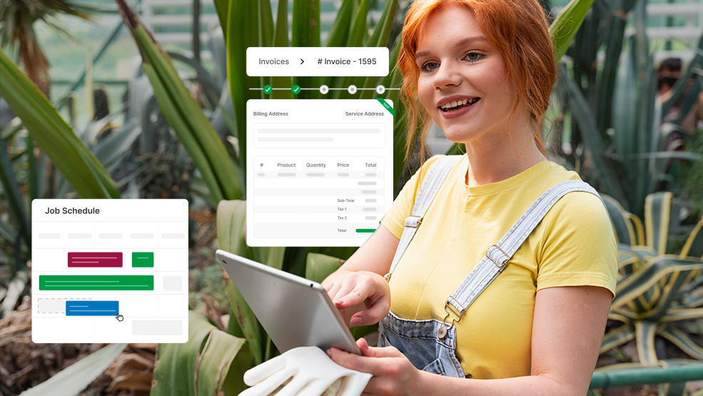 Woman in overalls uses tablet to manage invoices and job scheduling in a greenhouse setting