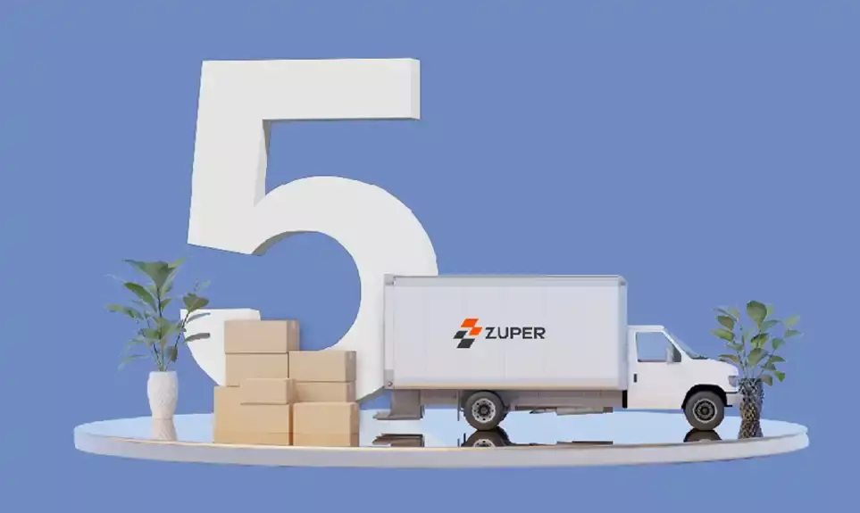 3D delivery scene with large number 5, Zuper-branded box truck, stacked cardboard boxes, and potted plants
