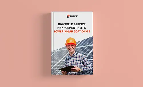Zuper eBook cover showing solar technician with tablet at panel installation site