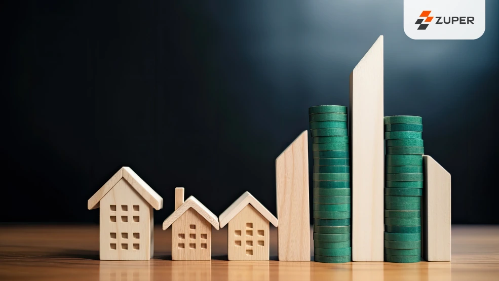 Wooden house models and stacked coins beside rising bar graph showing property investment growth