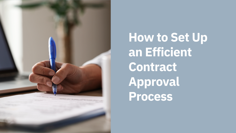 Person signing a contract document with a blue pen at a desk