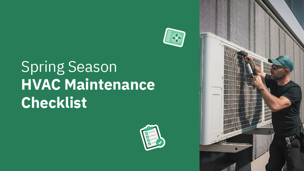 HVAC technician servicing an outdoor air conditioning unit with a drill during spring maintenance