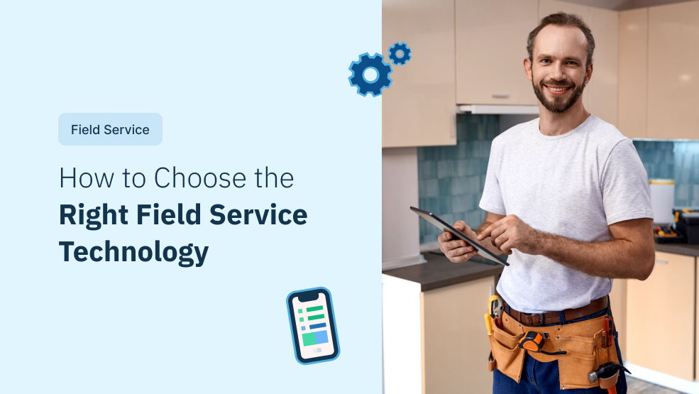 Field service technician holding tablet with tool belt in residential kitchen