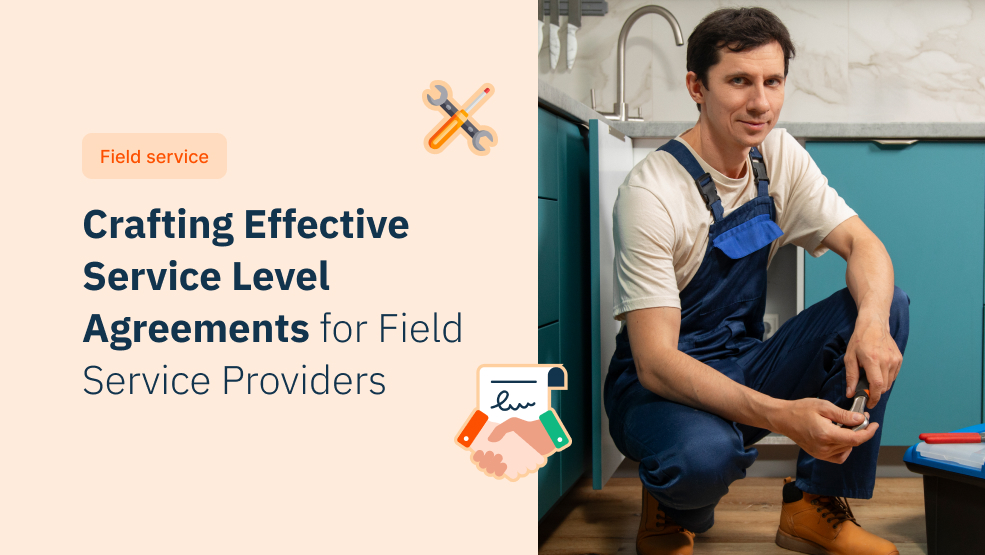 Plumber in blue overalls crouching in a kitchen, representing field service provider SLA agreements